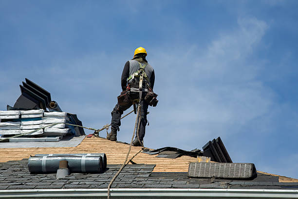 Professional Roof Replacement technician working in Belleville, KS